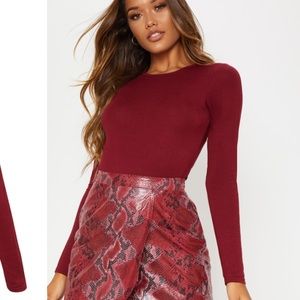 Pretty little thing Burgundy body suit